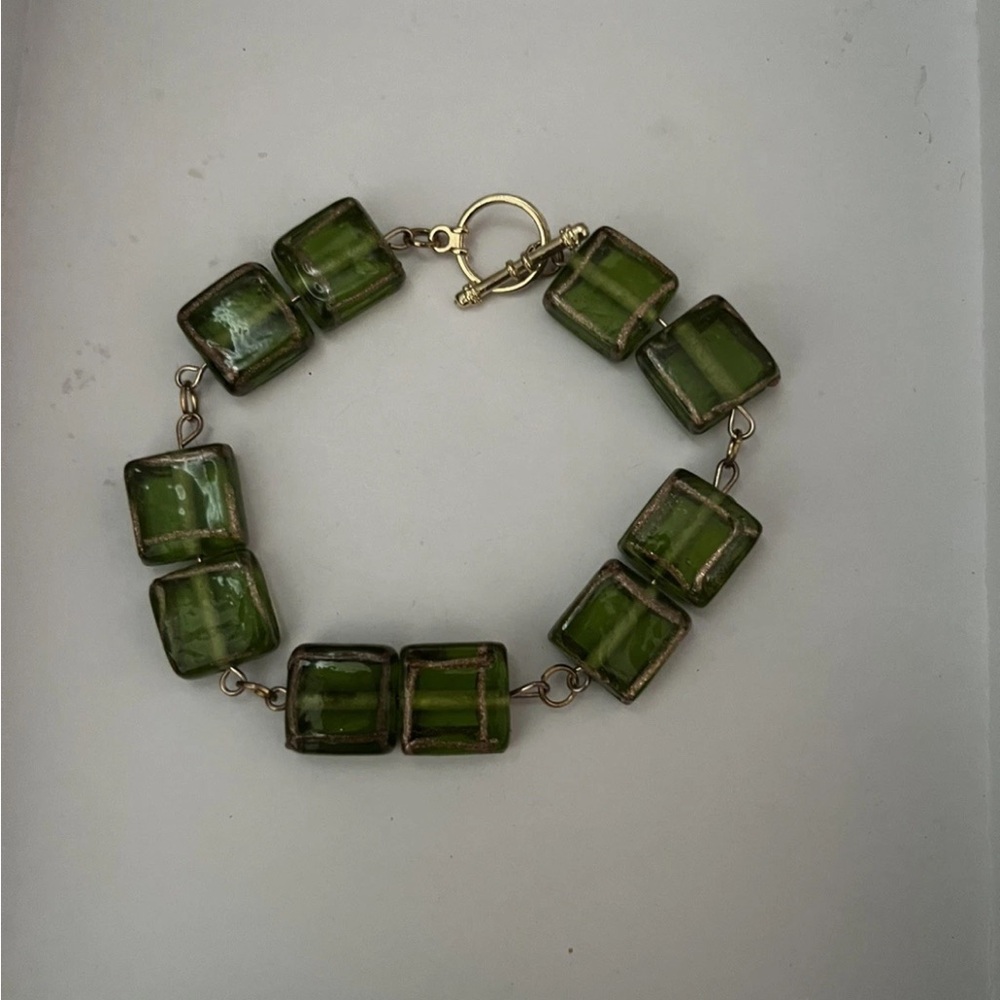 Green glass beaded bracelet with gold plated clasp. Fairycore, artisan bracelet.